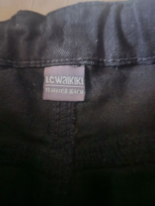 Blugi negri școală copii 164/170 7 buc 150 lei