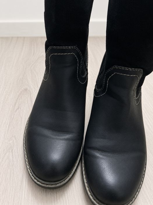 Ghete negre damă, elegante și versatile