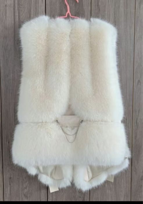 Меховая жилетка