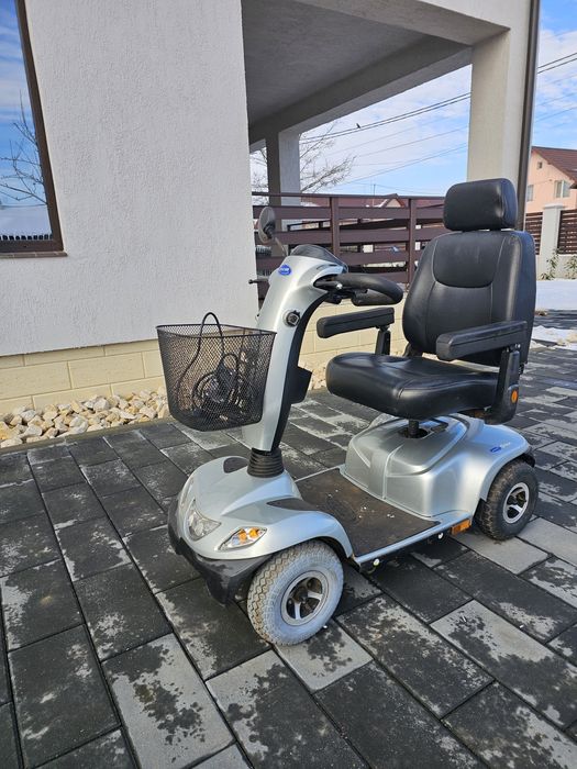 Scuter electric carut persoana cu dizabilitati  invocare