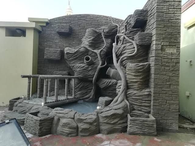 Водопад барельеф бассейн вольер