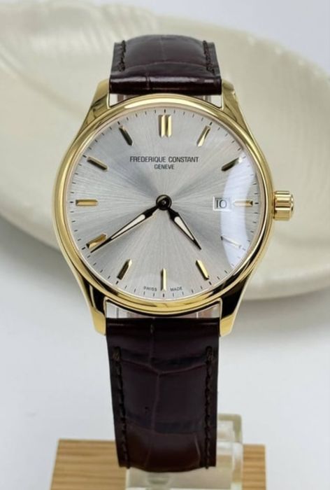 Швейцарские часы фирмы FREDERIQUE CONSTANT, кварцевый механизм