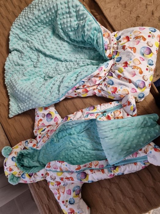 продам зимний комбинезон  с конвертом