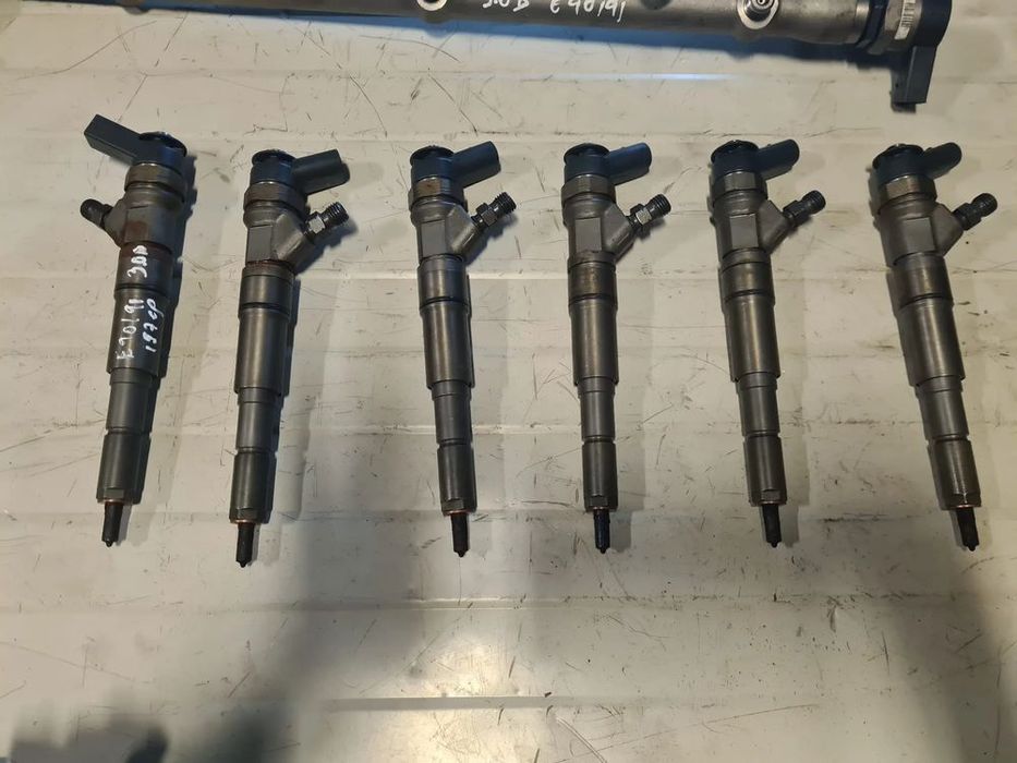 Injector,injectoare Bmw E 90/91,325/330,E60 525/530