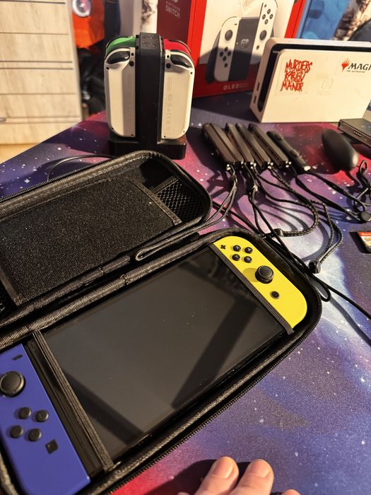 Nintendo Switch OLED – Pachet complet (6 controllere + 5 jocuri)