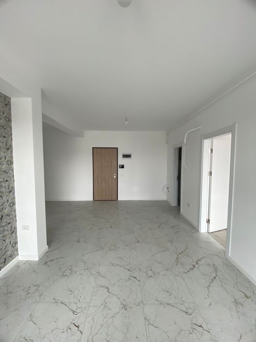 Apartament cu 3 camere+ loc de parcare.