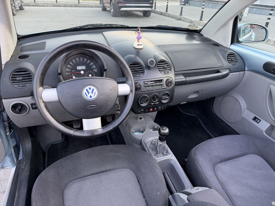 Volkswagen New Beetle “ broscuță” •An 2003 • 1.6 benzina•