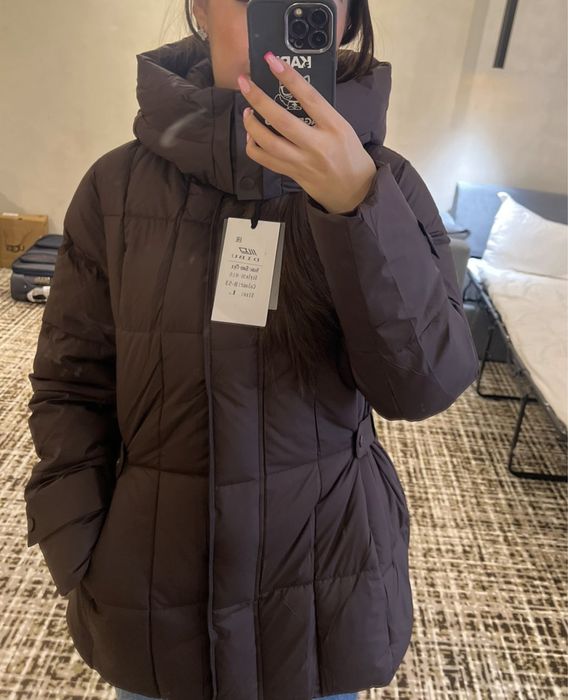 продам пуховик новый