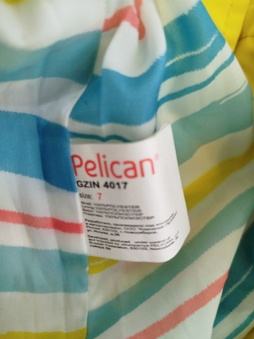 Фирменный дождевик на девочку