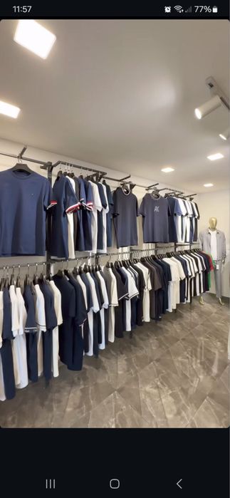 Стеллажи для магазинов одежды от бренда вешалки рейлы ветрина