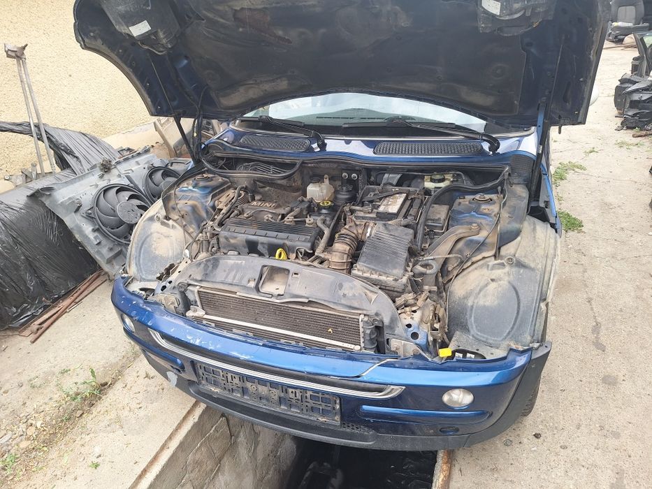 Dezmembrez mini cooper  1.6 benzina