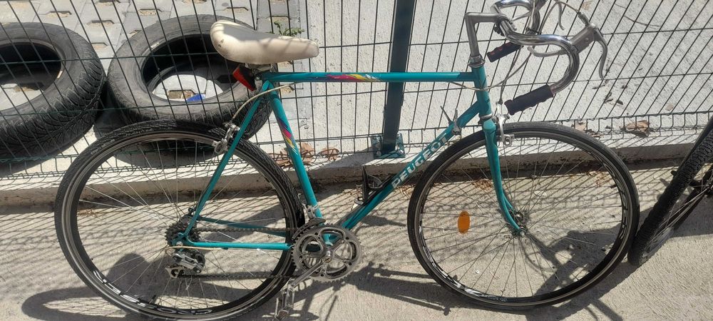 Шосеен велосипед Peugeot + електрически двигател и тренировъчна стойка ...