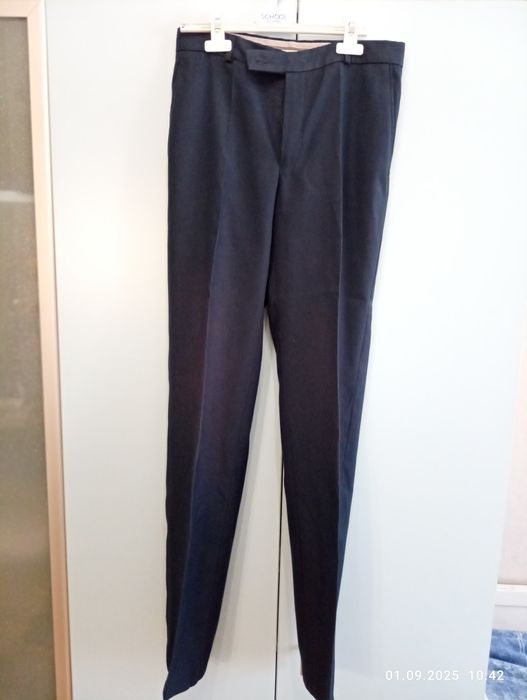 Школьные брюки б/у для мальчика 42/170