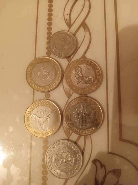 Юбилейные монеты и 10000 тг