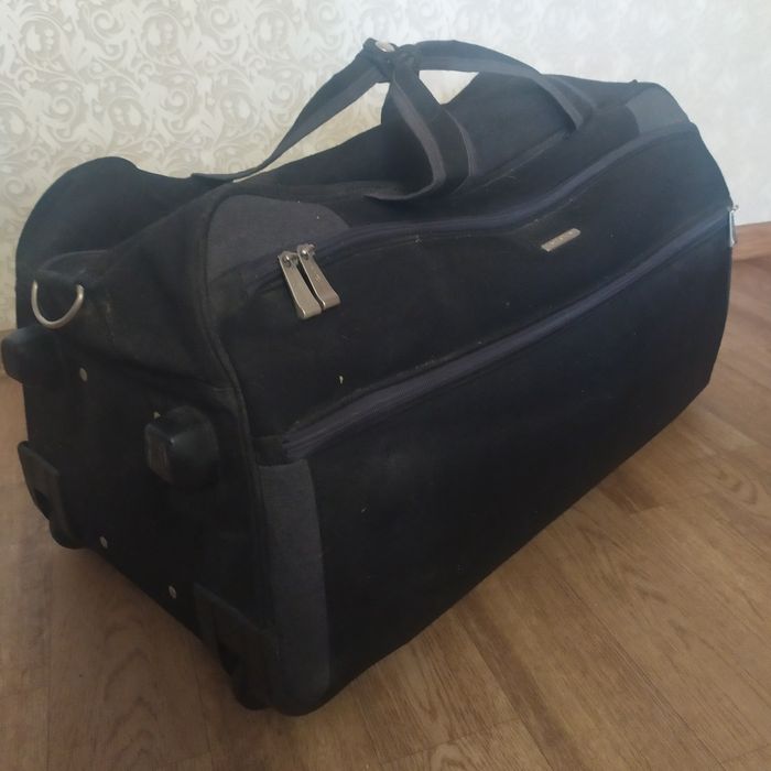 2 дорожные сумки на колесиках