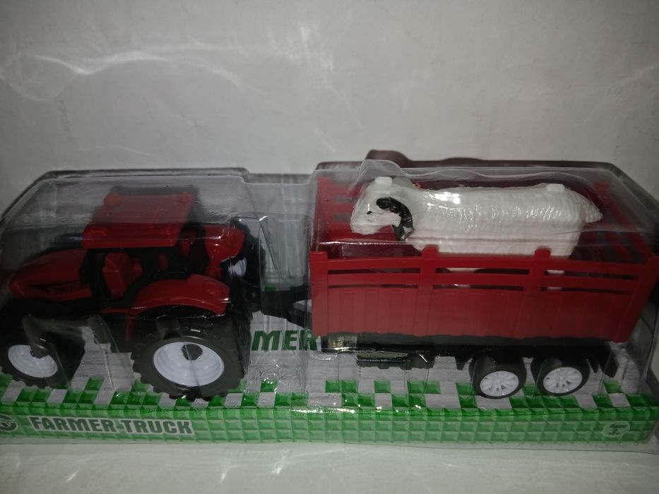 Продам! Новый.  Игрушки.   трактор. Ул. Валиханова167