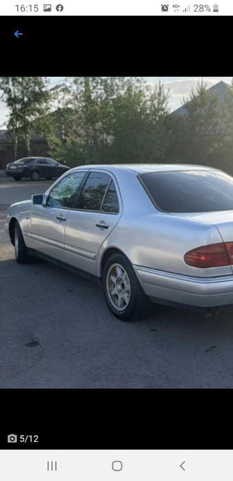 Мерседес 210.