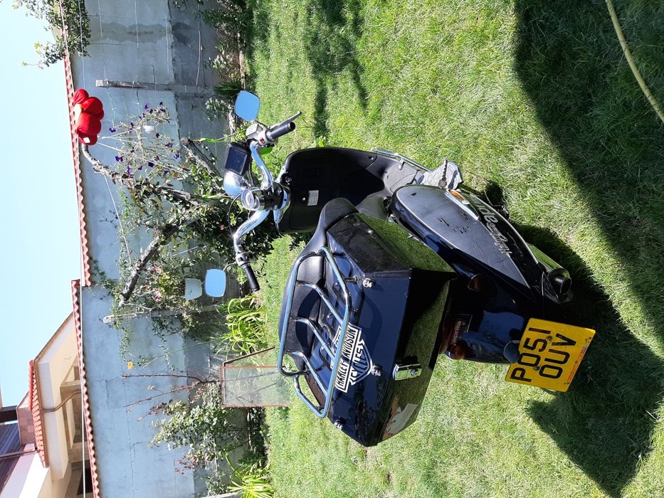 Скутер Априля 125 кубика