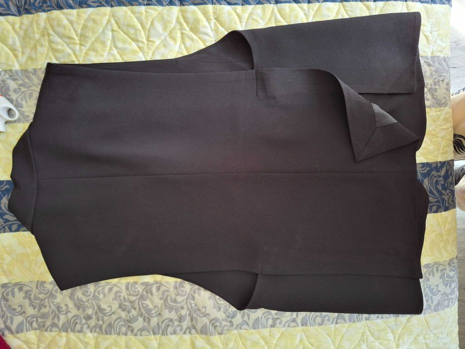 Продам пиджак без рукавов новый