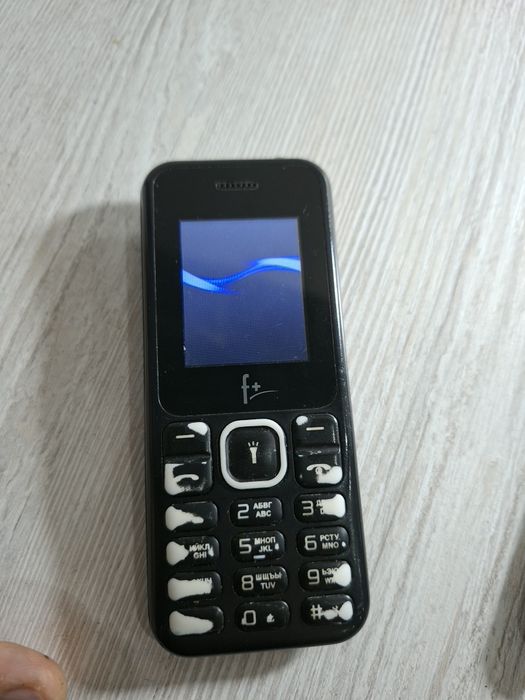 Knopkali telefon