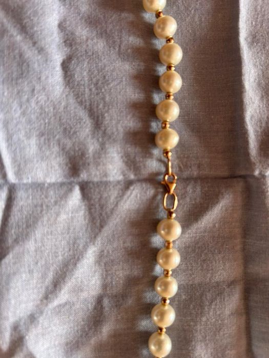 Жемчужное ожерелье продается