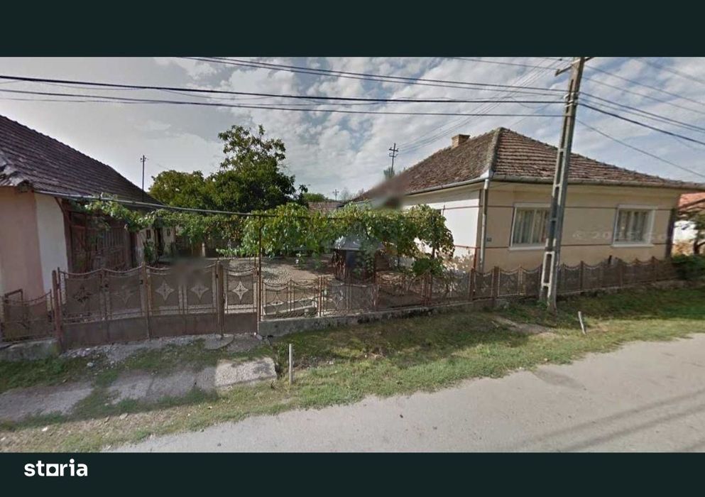 Casă cu teren generos