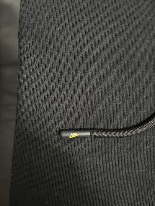 Pantaloni Nike NOCTA negri – noi, cu etichetă