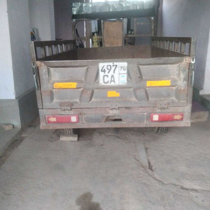 Мотоцикл келишган холда