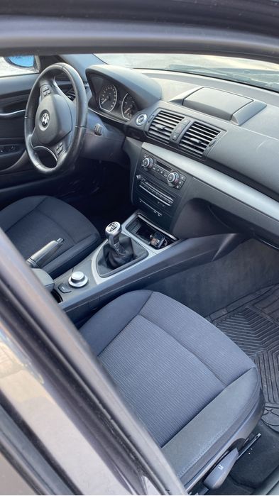 Vand bmw seria 1/navi/trapa /senzori parcare/comenzi volan