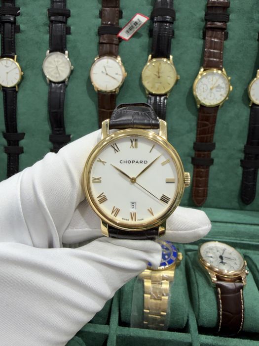 Золотые часыHarry Winston Premier Perpetual Calendar 18k