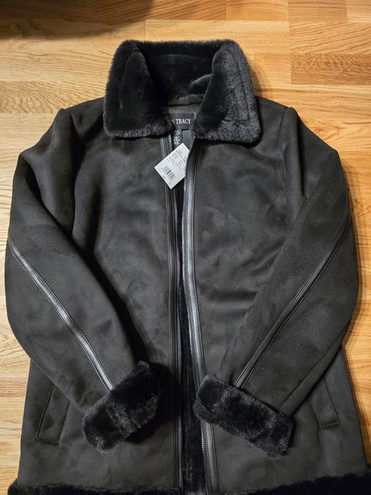 Haină din blană ecologică nouă.