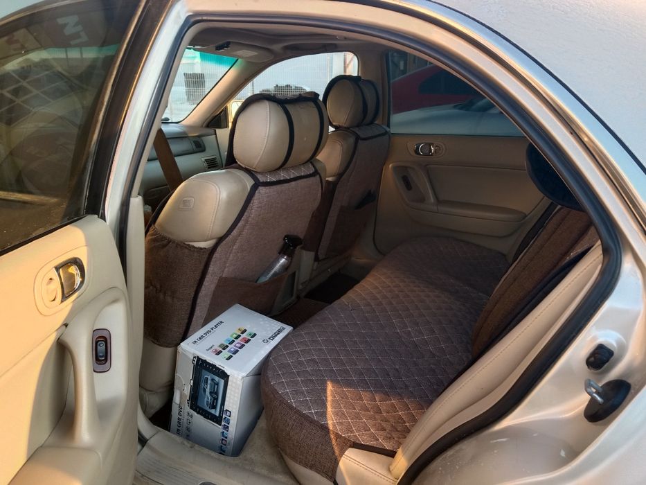 Мазда.  Милления