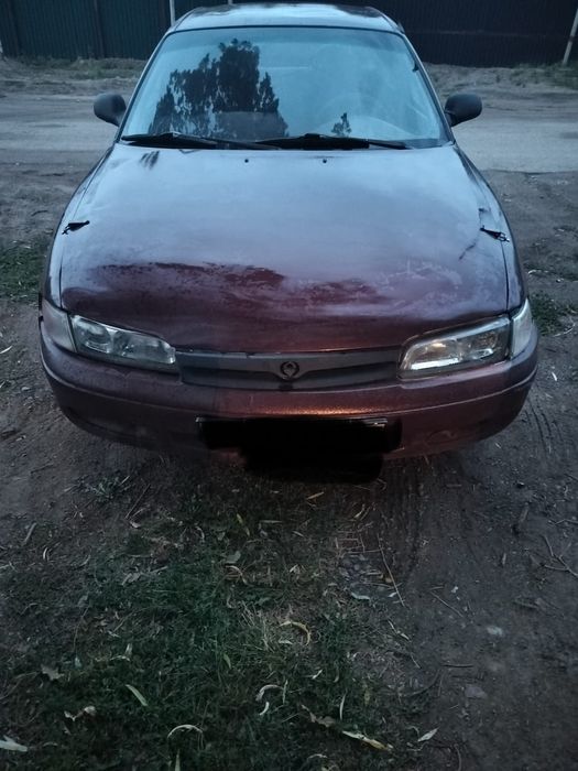 Машина Мазда кронус