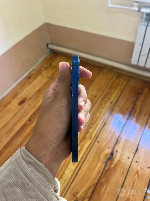Iphone 12 mini xama joyi radnoy ochilmagan ozginda chaqa chuqalari bor