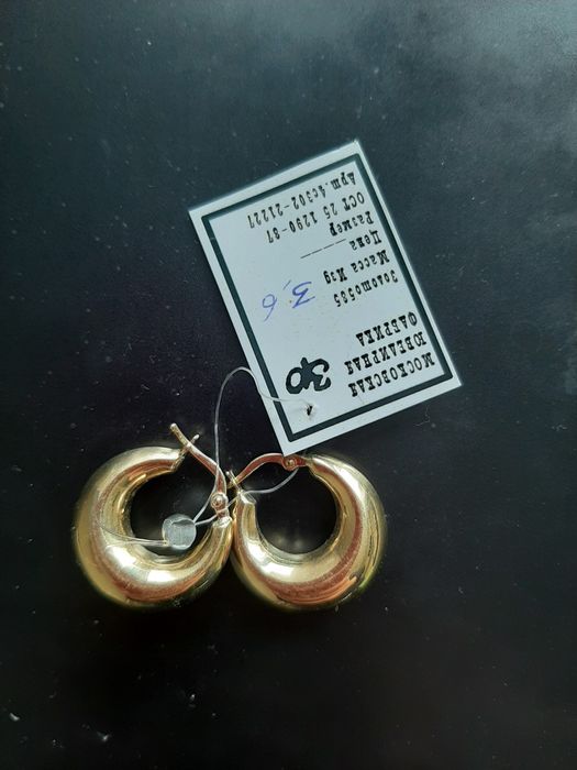 Продам золотые серьги