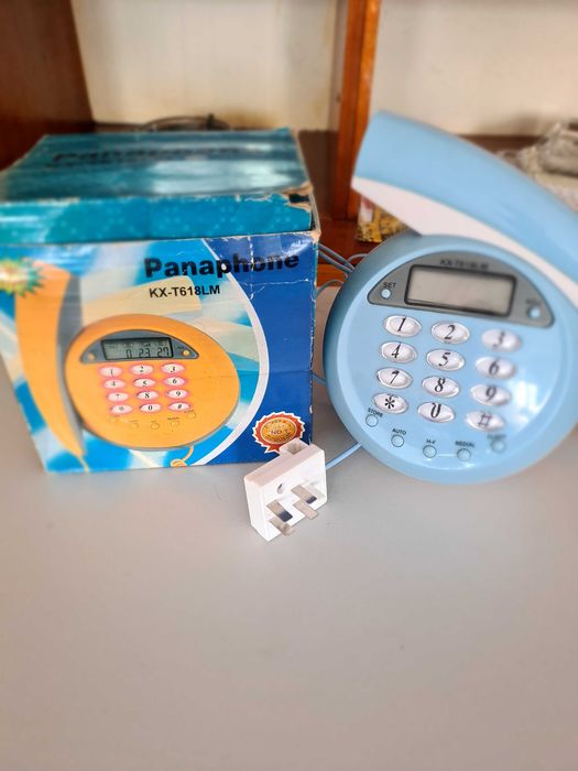 Стационарен телефон с копчета