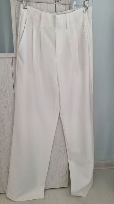 Pantaloni dama din stofă