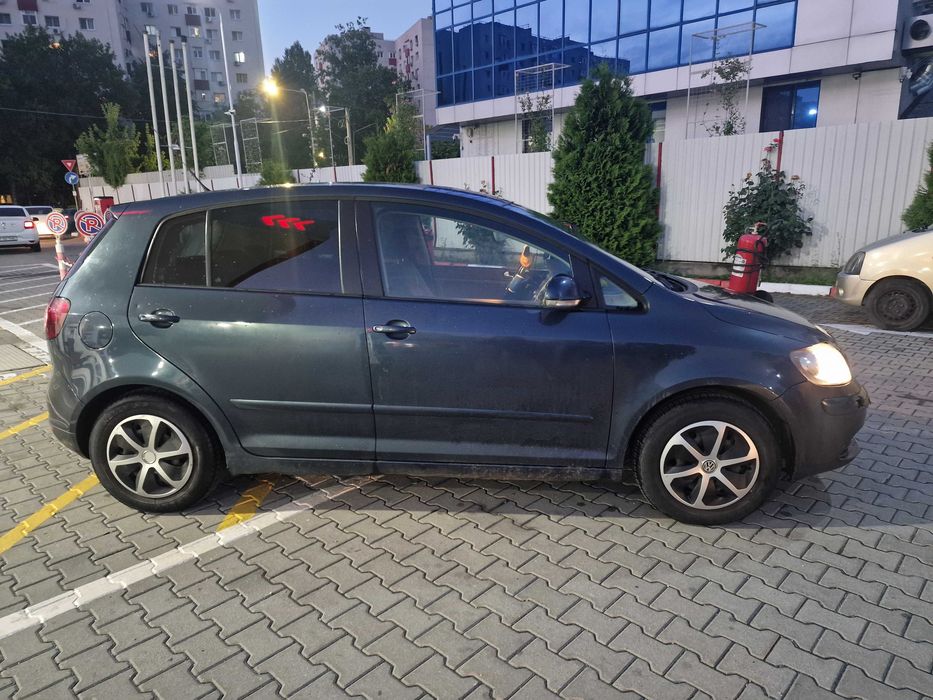 Wv golf 5 plus 1.4 benzina, clima 2 zone, scaune incalzite