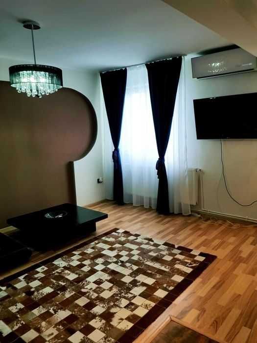 Închiriez apartament complet utilat.