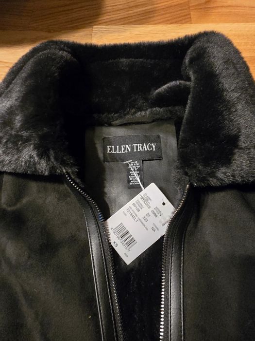 Haină din blană ecologică nouă.