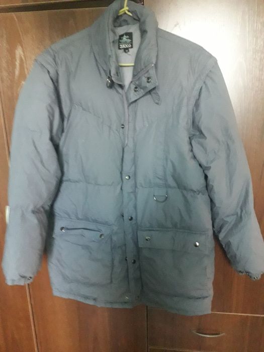 Продаю пуховик новый