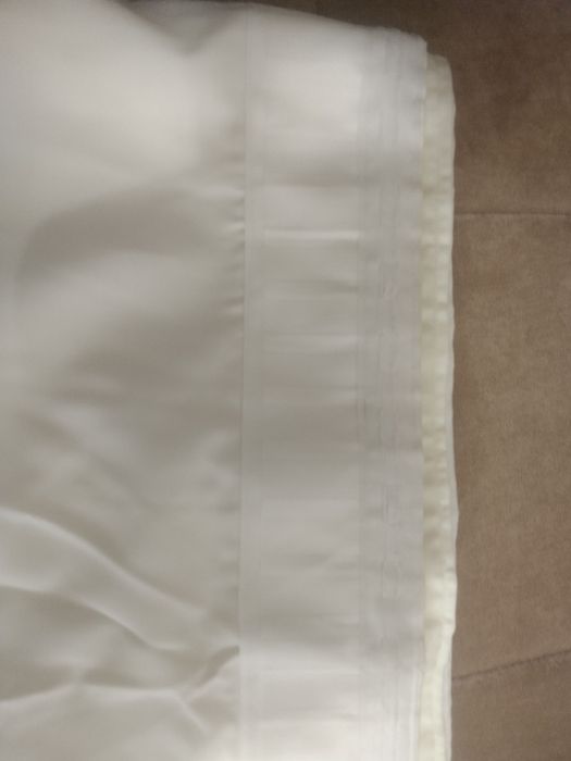 Шторы новые  2 штуки