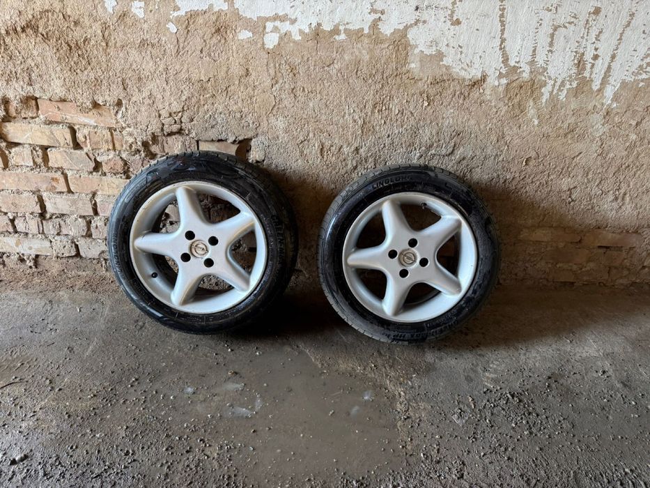Новые шины с дисками на опель