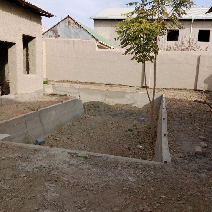 Ромитан сентрда курилиши тугалланмаган участка сотилади 4.6 сотих. Тел