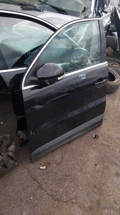 Usa stanga/dreapta fata Volkswagen Tiguan an 2009