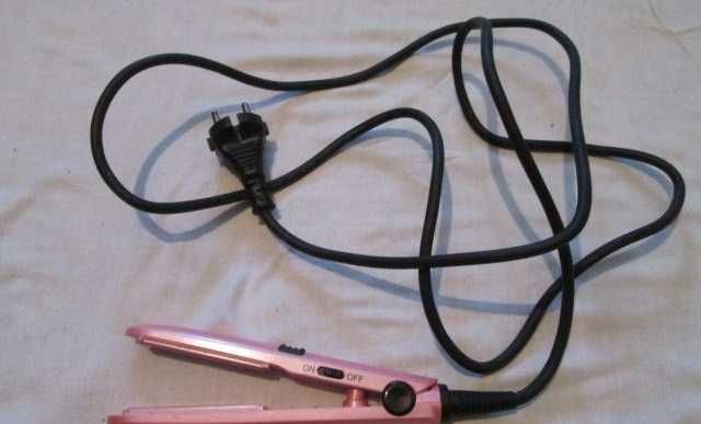 UNOLD маркова мини преса за коса.