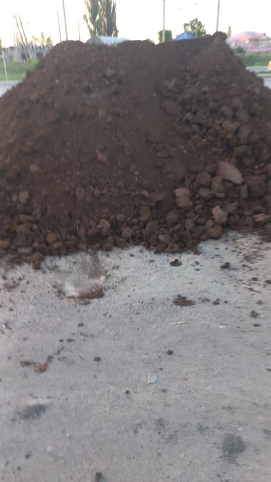Навоз перегнои мешками.