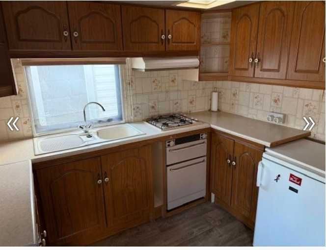 Teren intravilan 500 mp cu casa mobila
