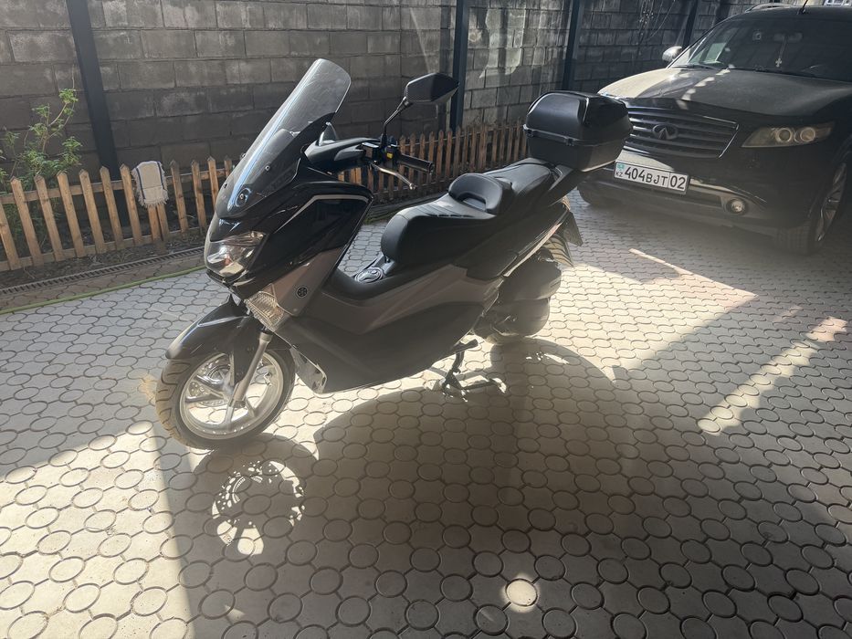 Сеутер моппед NMAX