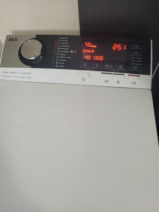 Masina de spalat rufe cu incarcare verticala AEG